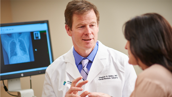 An AHN physician consulting with a patient.