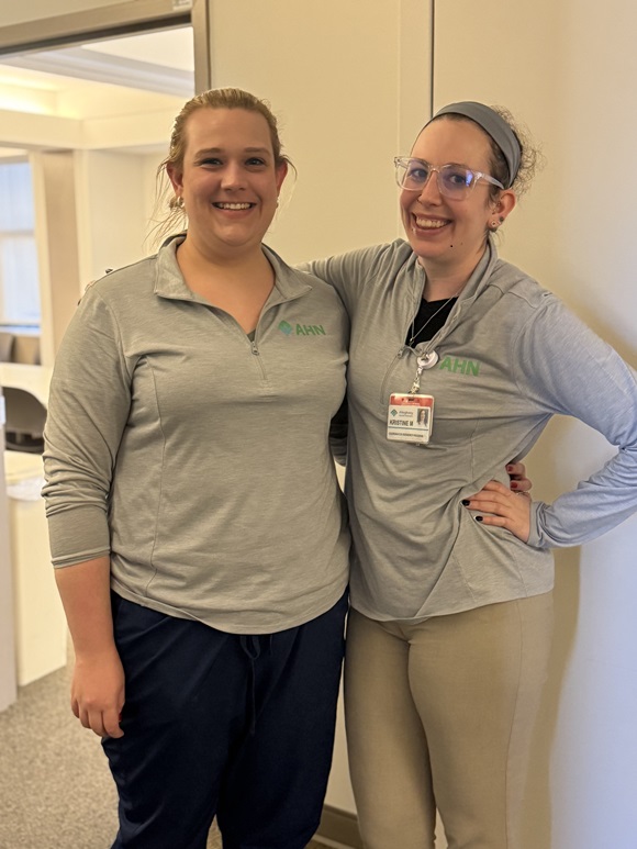Candid photo of  program coordinator and fellow matching