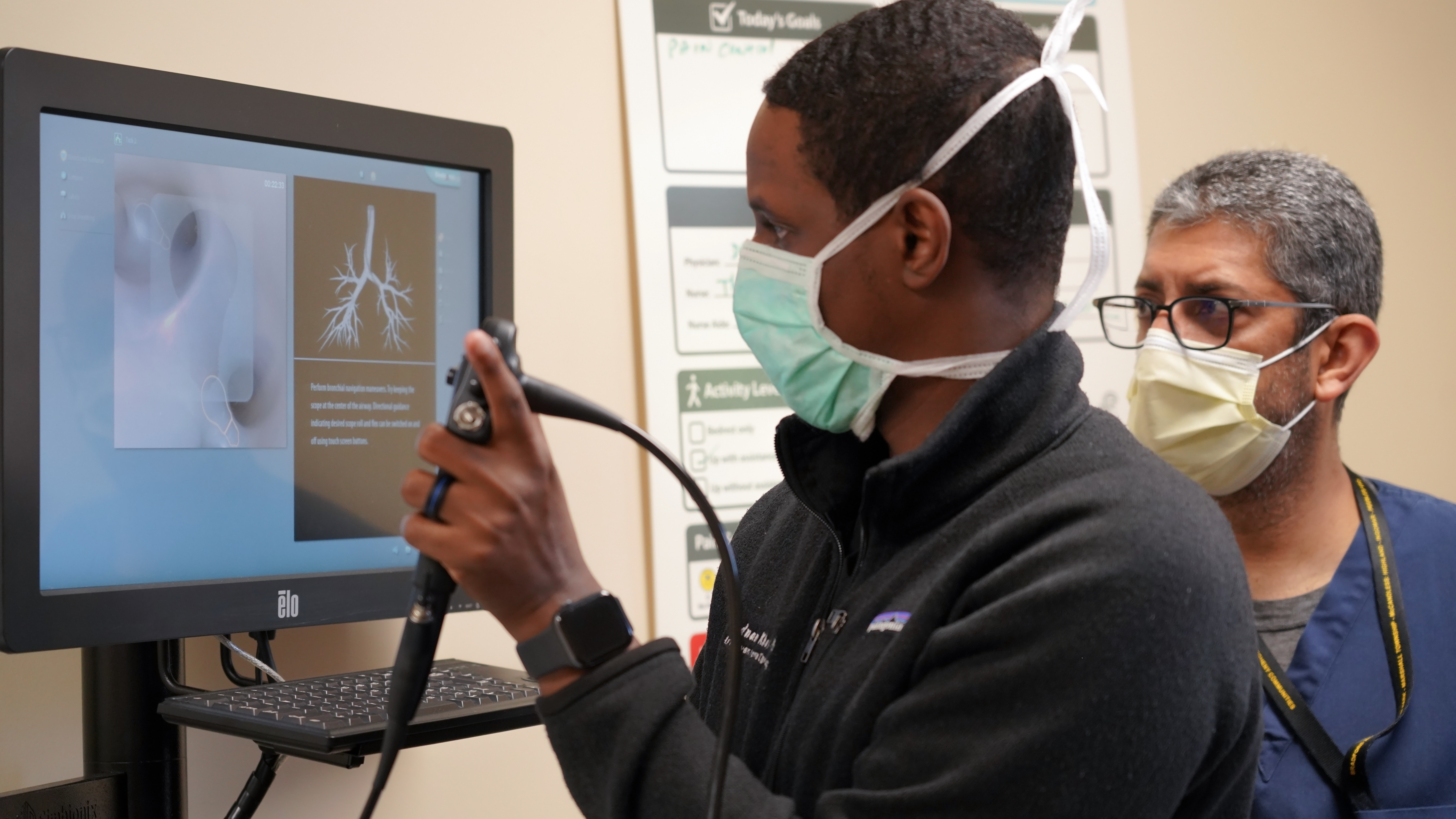 Doctors working in cadaver lab