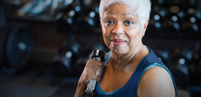 A woman taking a break from exercising.