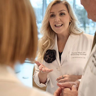 AHN cancer specialist talking to patient.