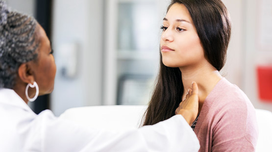 A doctor examining a patient.