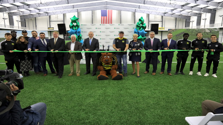 Elected officials join AHN and Highmark leaders to cut the ribbon on the new AHN Montour Health + Sports Medicine Center 